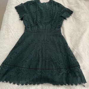 Hunter green boutique brand knee length lace dress.  Size small